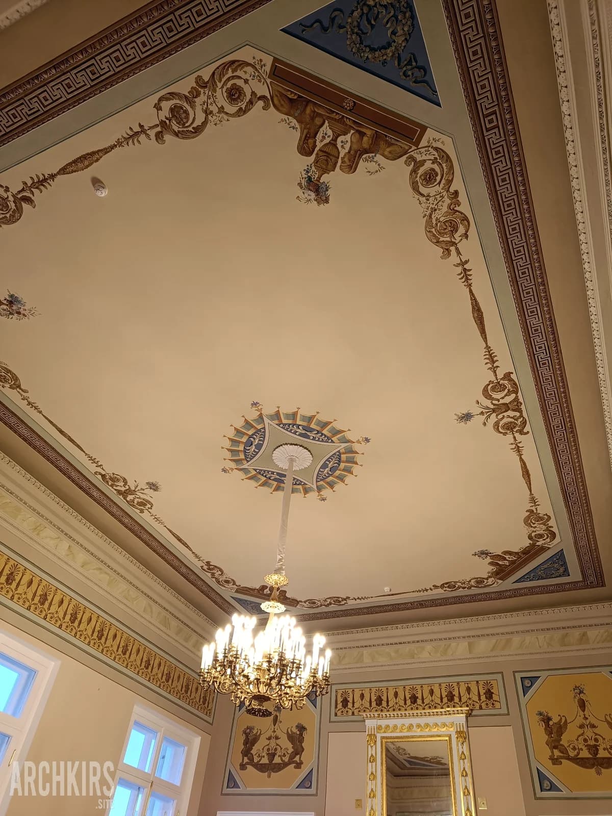 Painted ceiling and chandelier after restoration